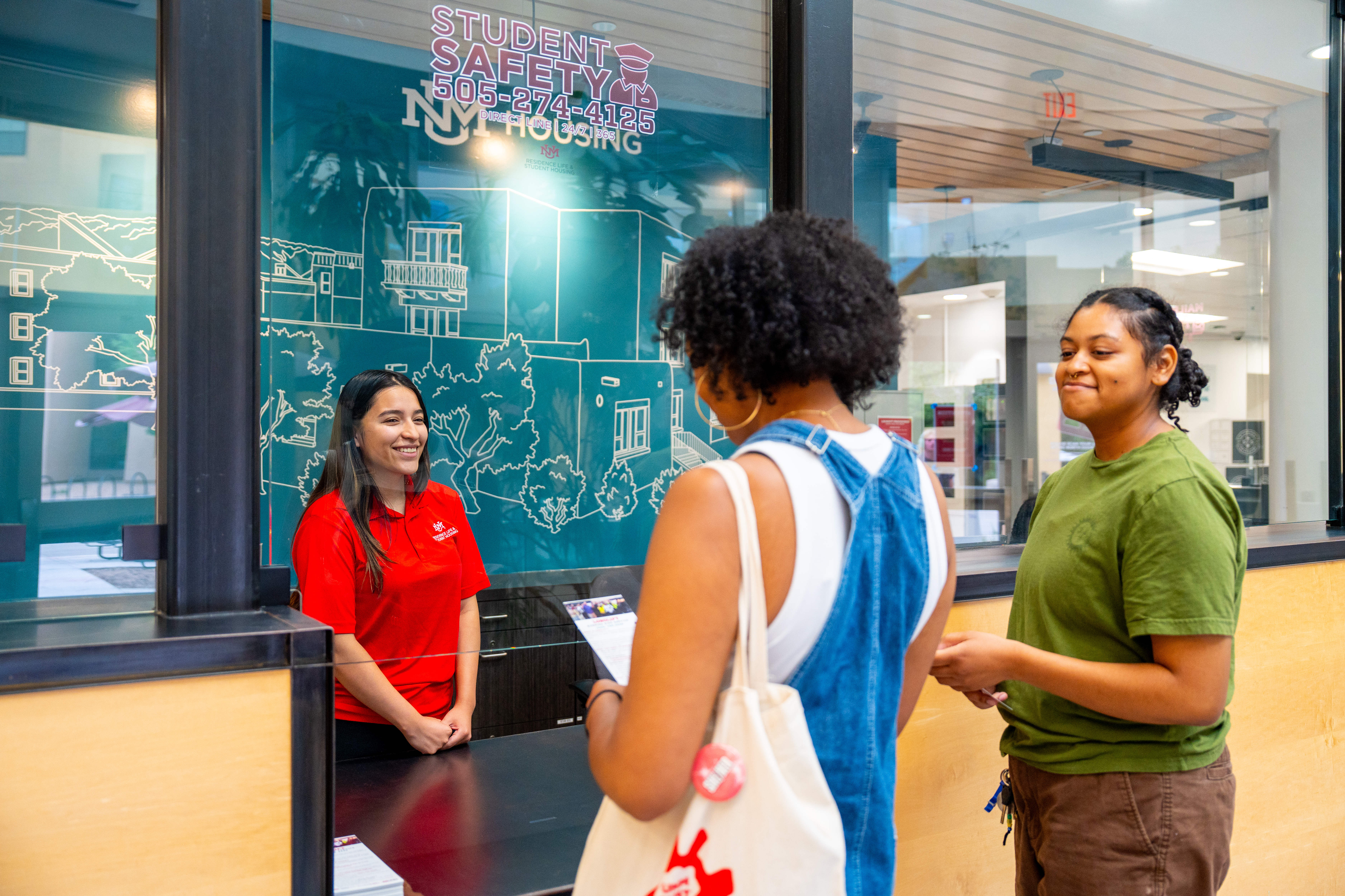 Student standing at the SRC Helpdesk